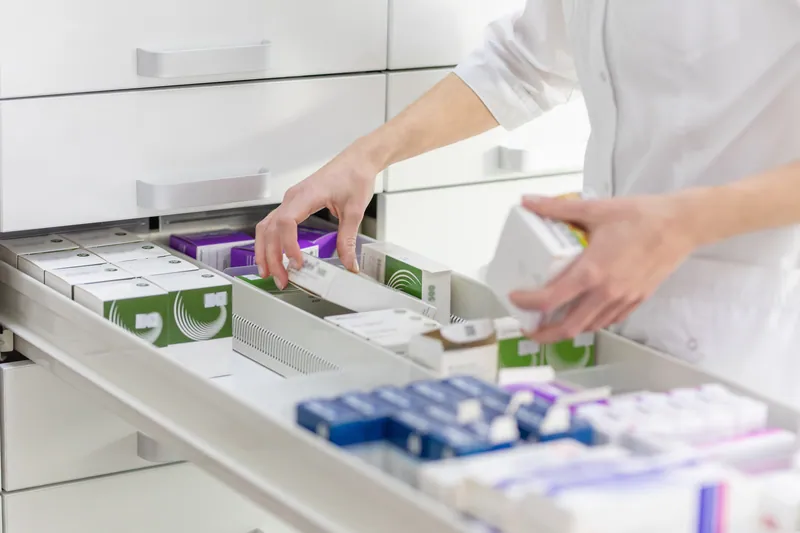 Pharmacist Stocking Medicines