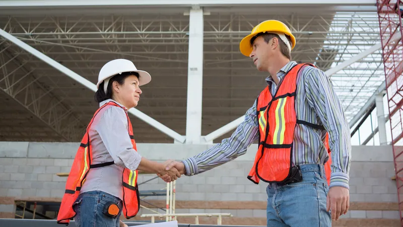 Construction Workers Shaking Hands